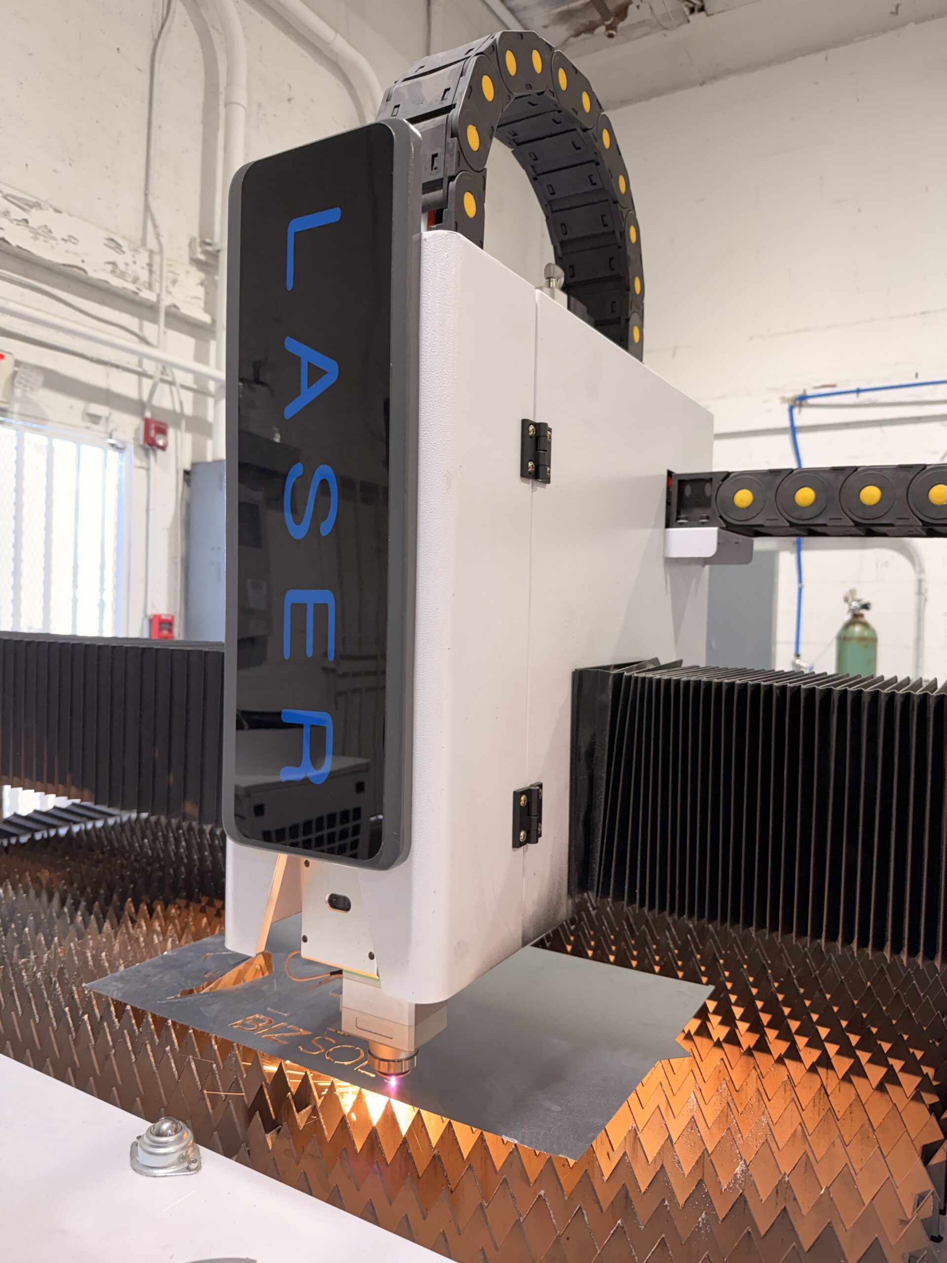 Precision cutting equipment used to produce clean edges and accurate metal panel lengths