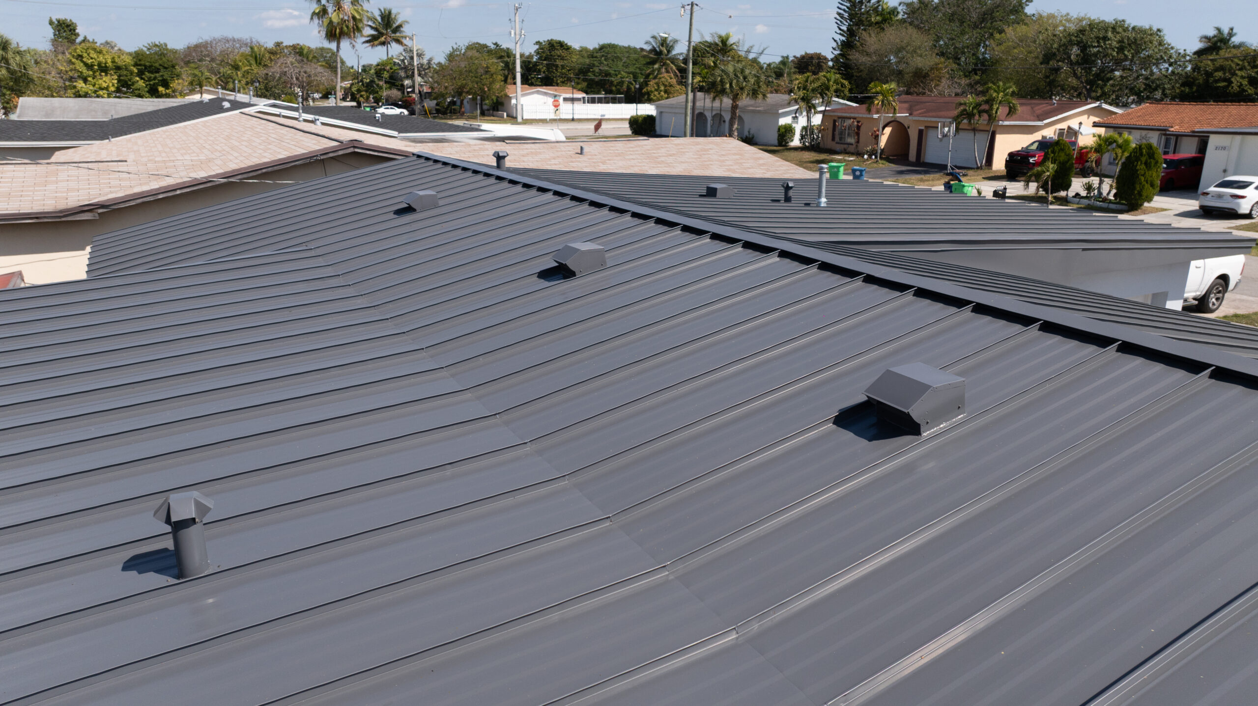 Modern metal roofing installation on residential home