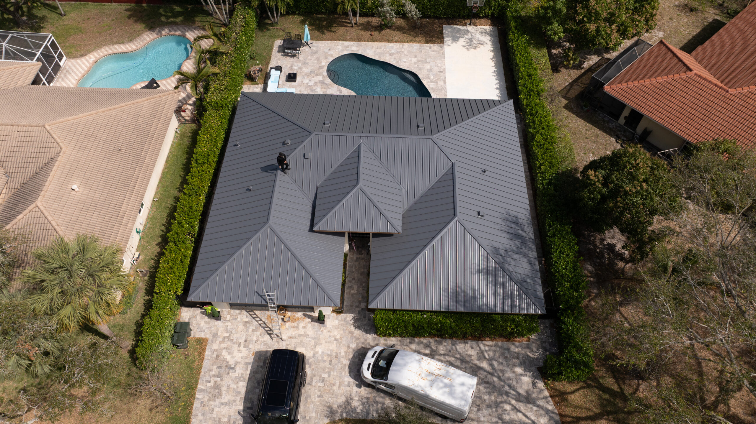 Modern metal roofing installation on residential home